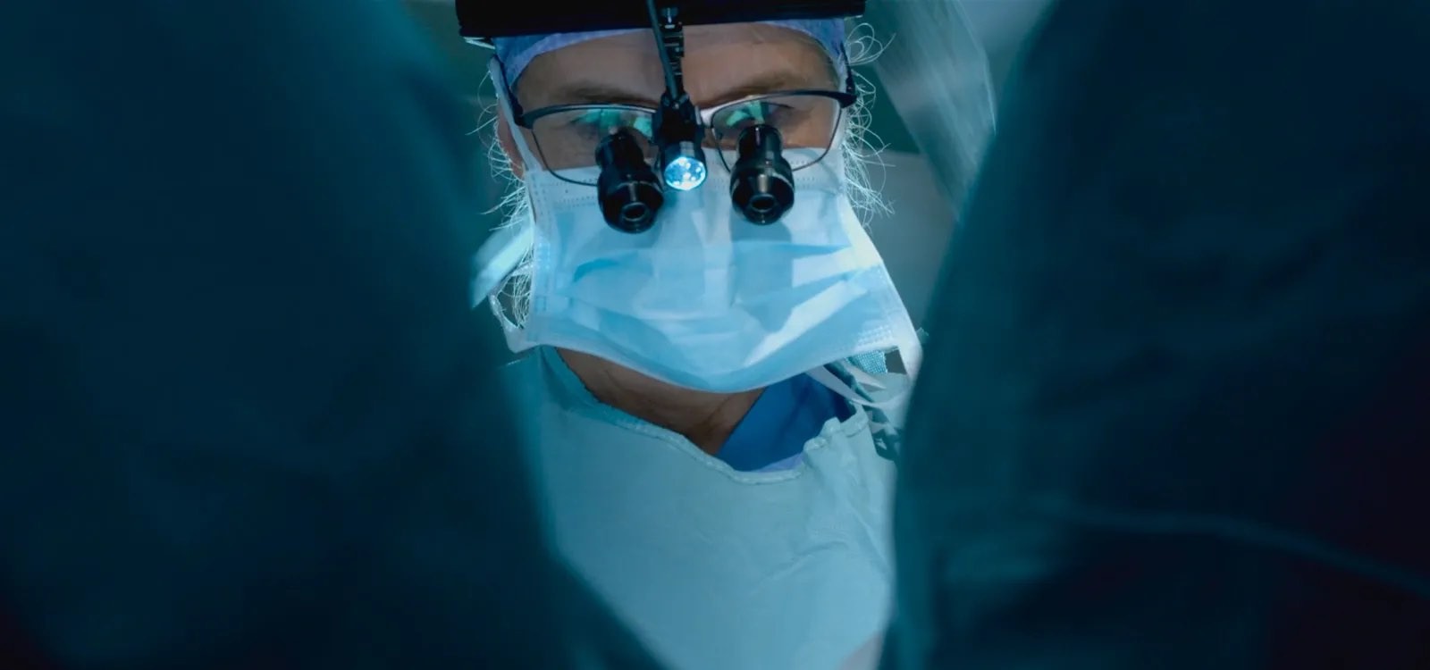 Heart surgeon during surgery.jpg